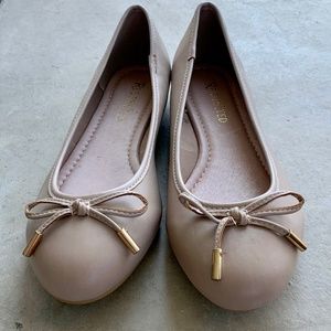 Tan flats with bow